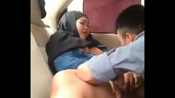Show Hijab girl in car with boyfriend new Clips