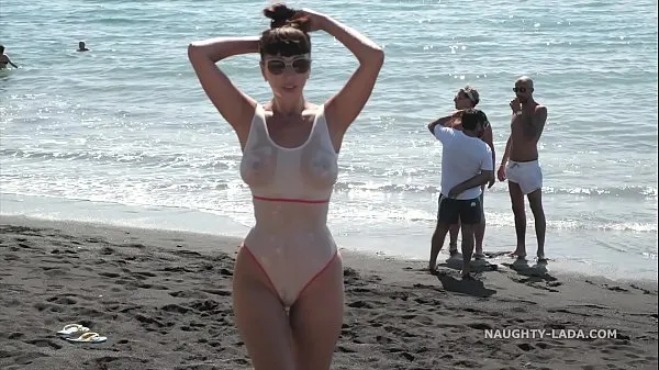 แสดง Naughty Lada takes off her sheer swimsuit and คลิปใหม่